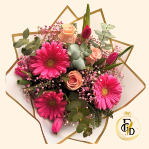Ramo Primaveral Rosado con Gerberas y Tulipanes